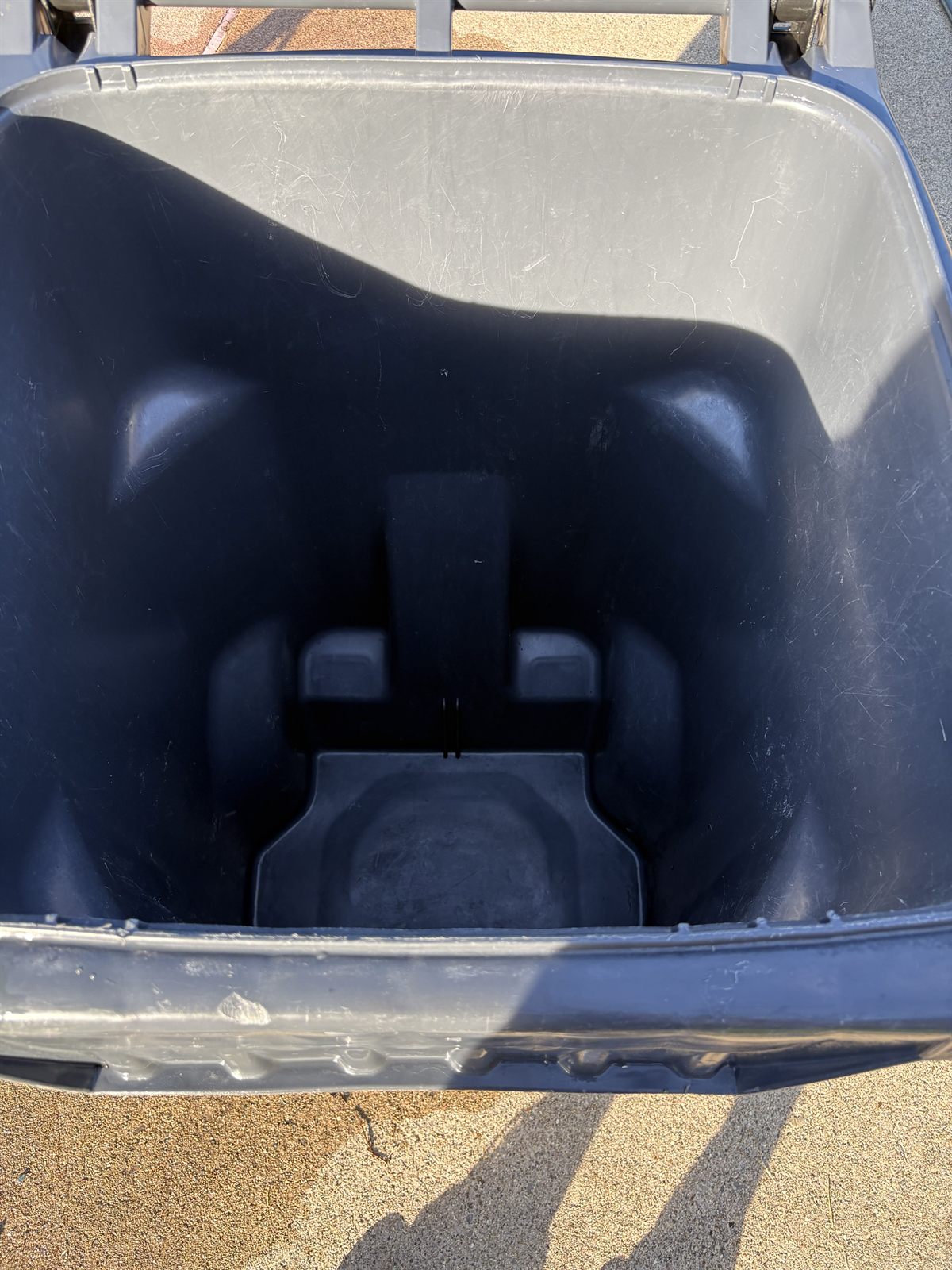 Clean, sanitized trash bin interior after a BinBoys cleaning
